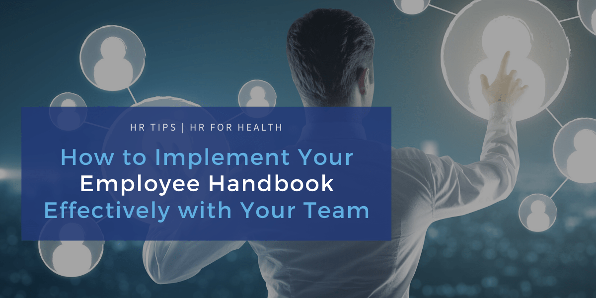 Team Using Handbook How to Implement Your Employee Handbook Effectively With Your Team