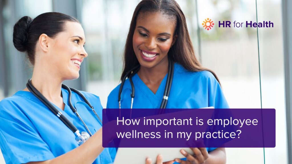 Two happy nurses with the blog title employee wellness programs in healthcare overlaid on top